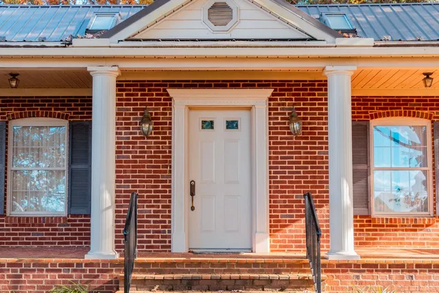 a kitchen with stainless steel appliances a sink and a refrigerator