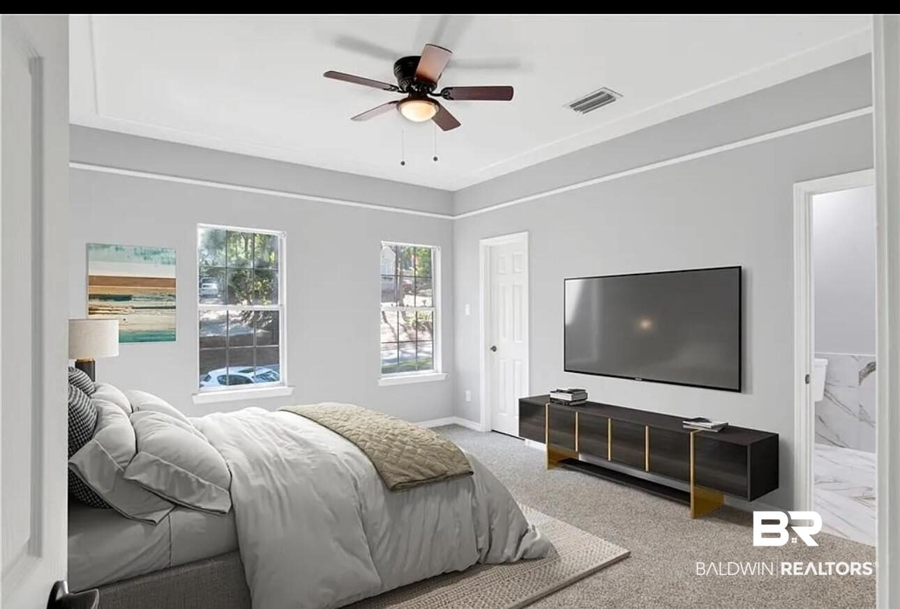 632 Ridgewood Drive Daphne, AL 36526 - Photo 28 of 36 Carpeted bedroom featuring ceiling fan