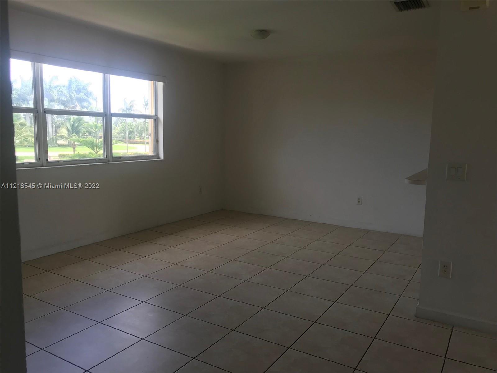 Malibu Bay Homestead, FL 33033 - Photo 10 of 12 an empty room with windows
