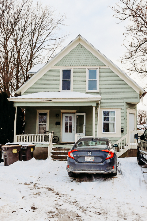 1258 South Galena Avenue Freeport, IL 61032 - Photo 2 of 11 a car parked in front of white house