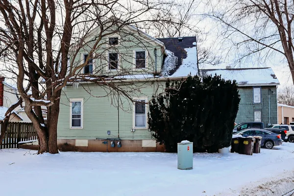 a view of a house with a snow