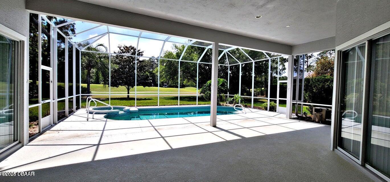 1070 Hampstead Lane Ormond Beach, FL 32174 - Photo 13 of 18 a view of swimming pool with seating area