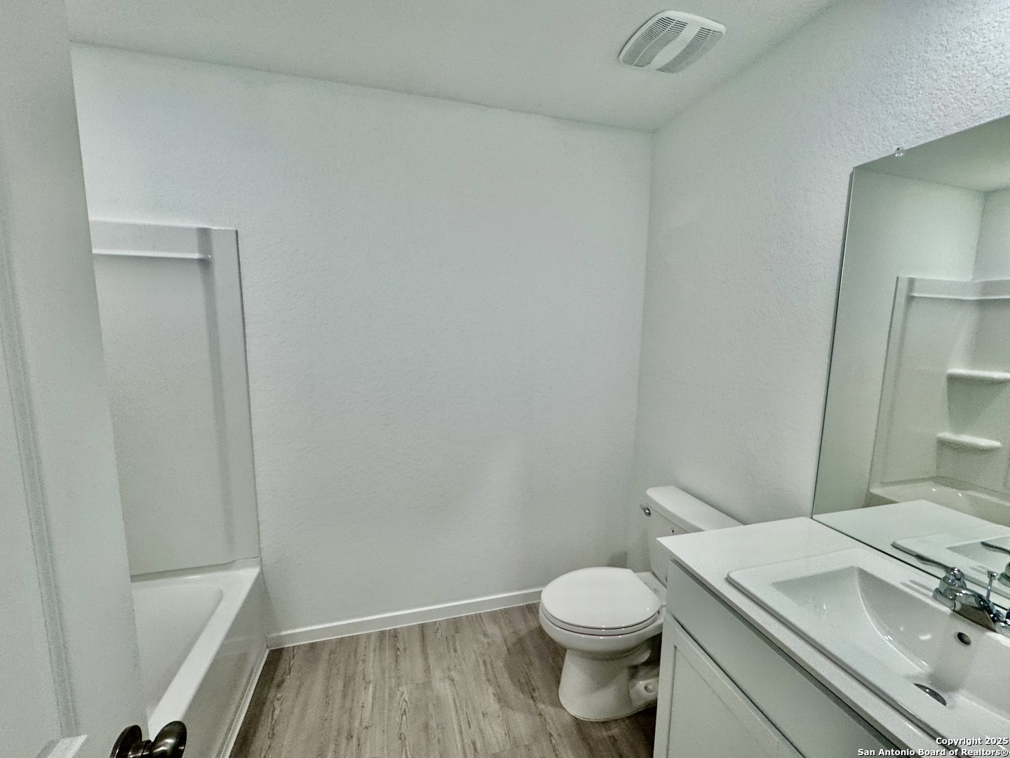 5151 Yancy Creek Converse, TX 78109 - Photo 13 of 17 a bathroom with a sink and a toilet