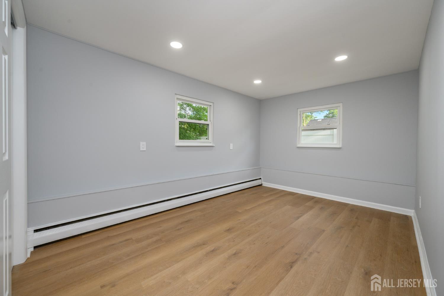 56 Drake Place Colonia, NJ 07067 - Photo 11 of 31 an empty room with windows