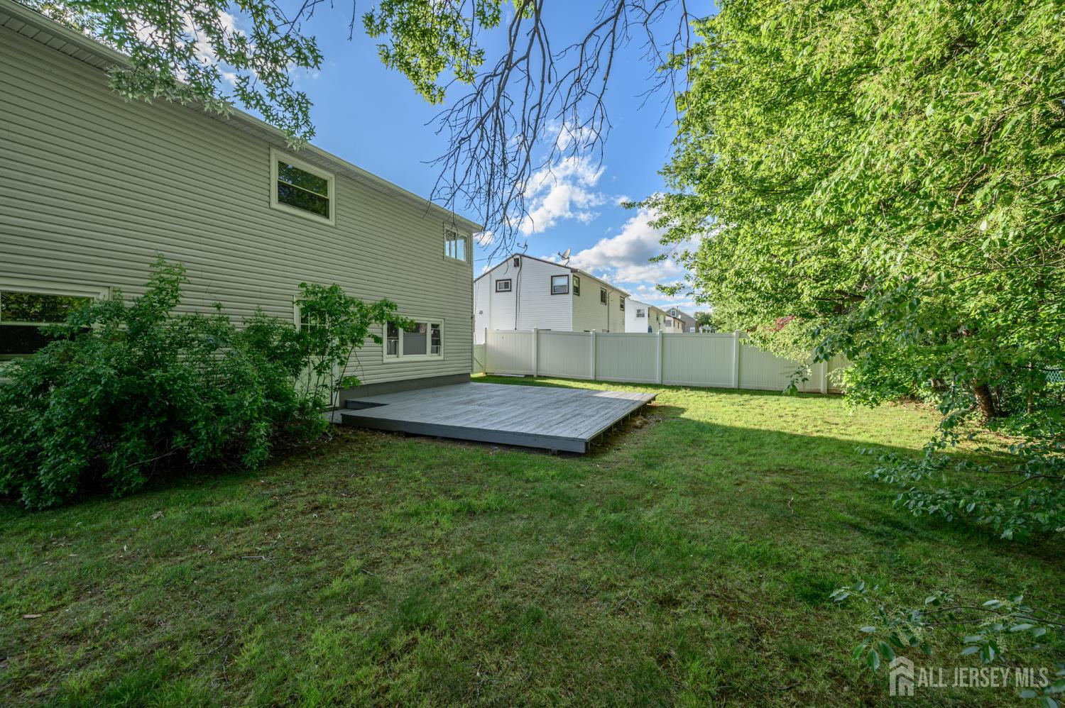 56 Drake Place Colonia, NJ 07067 - Photo 26 of 31 a view of a house with a yard