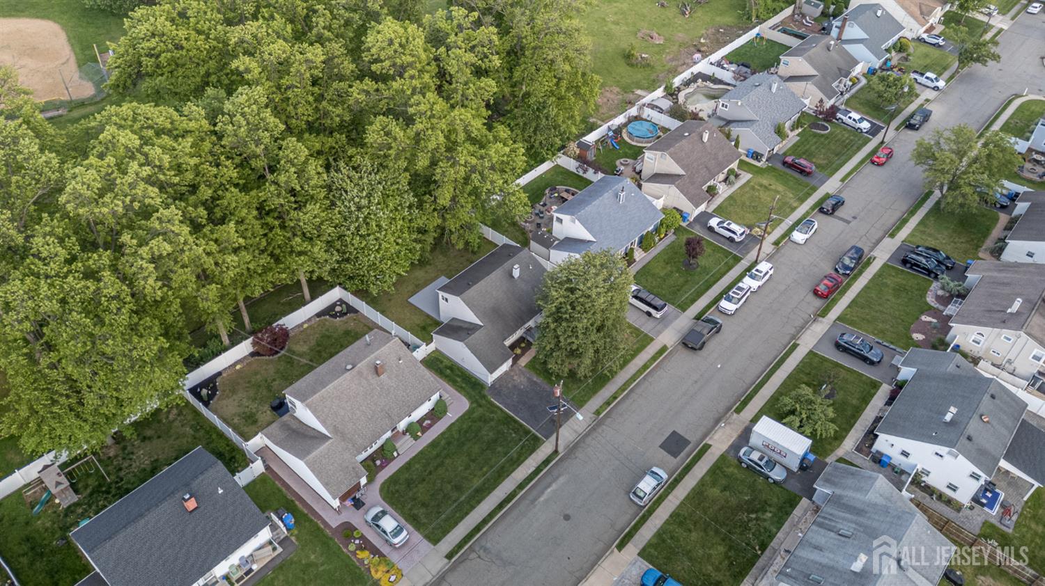 56 Drake Place Colonia, NJ 07067 - Photo 31 of 31 an aerial view of a house with a yard