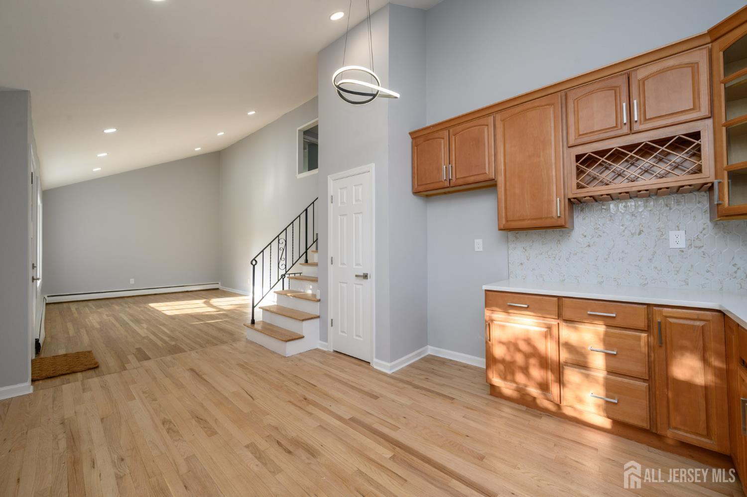 56 Drake Place Colonia, NJ 07067 - Photo 7 of 31 a view of an entryway with wooden floor