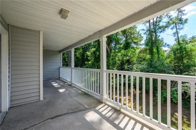a view of a balcony with swing