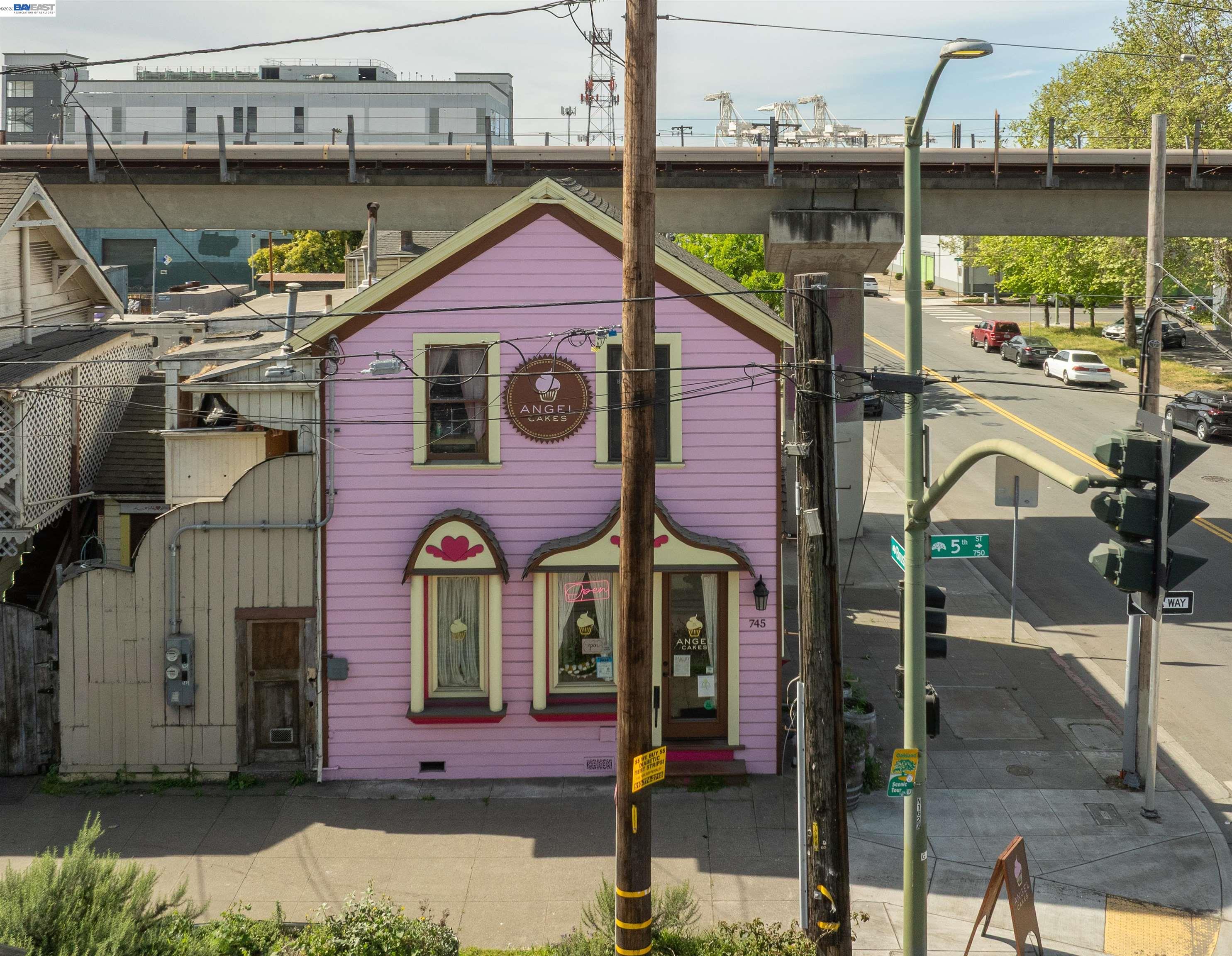 745 Fifth Street Oakland, CA 94607 - Photo 21 of 26 a front view of a house with a yard