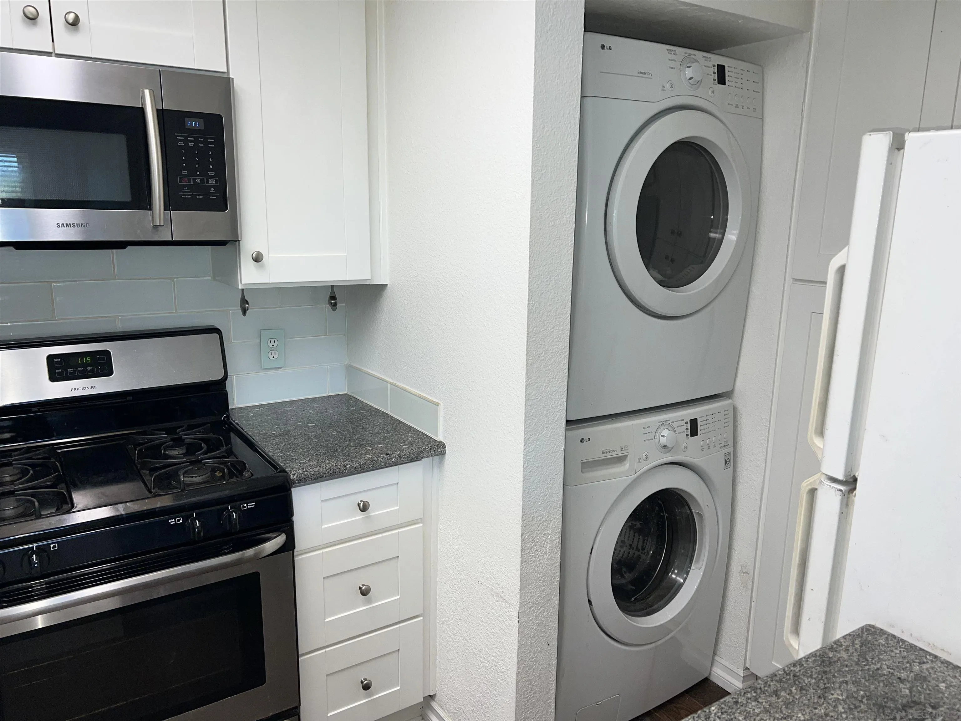 3043 Chipwood Court Spring Valley, CA 91978 - Photo 14 of 38 a kitchen with a stove and a sink