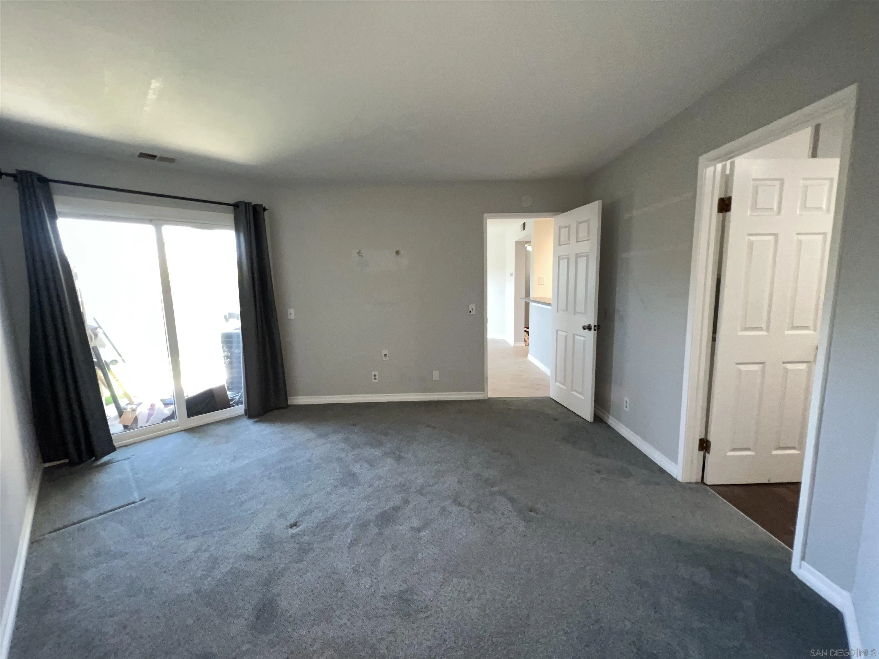 3043 Chipwood Court Spring Valley, CA 91978 - Photo 21 of 38 an empty room with windows and closet