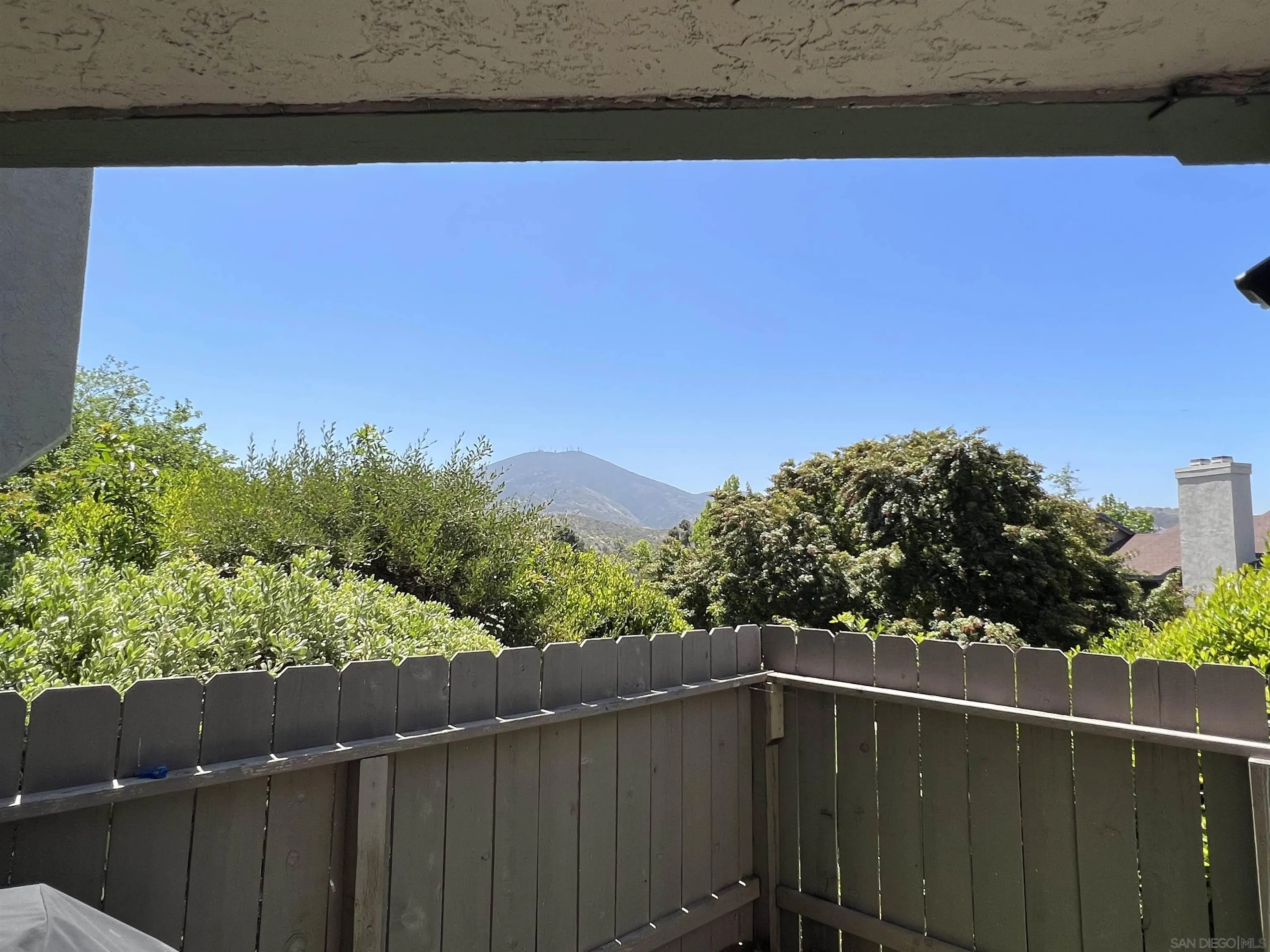 3043 Chipwood Court Spring Valley, CA 91978 - Photo 28 of 38 a view of a balcony with wooden fence and floor