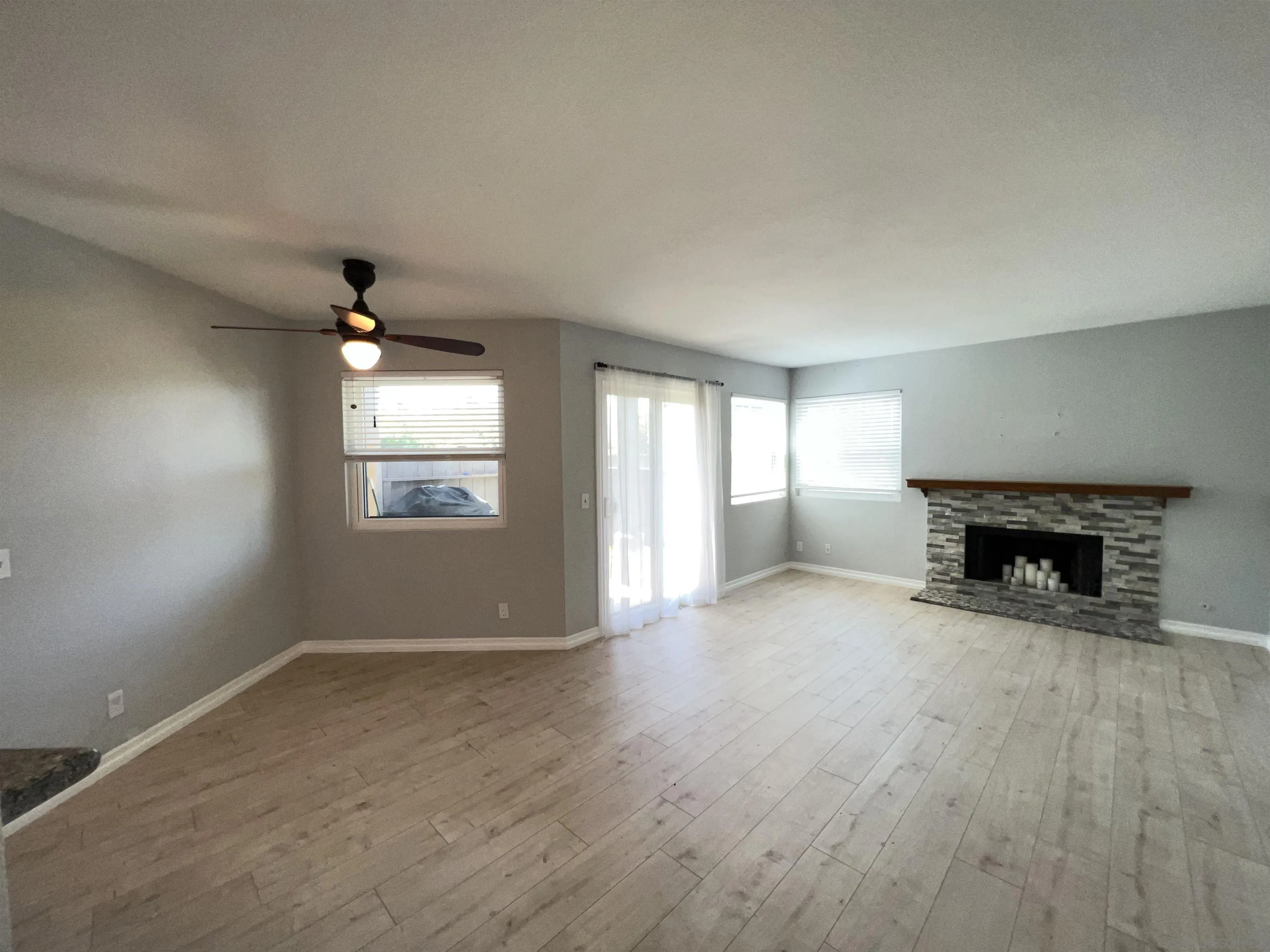 3043 Chipwood Court Spring Valley, CA 91978 - Photo 4 of 38 an empty room with windows and fireplace