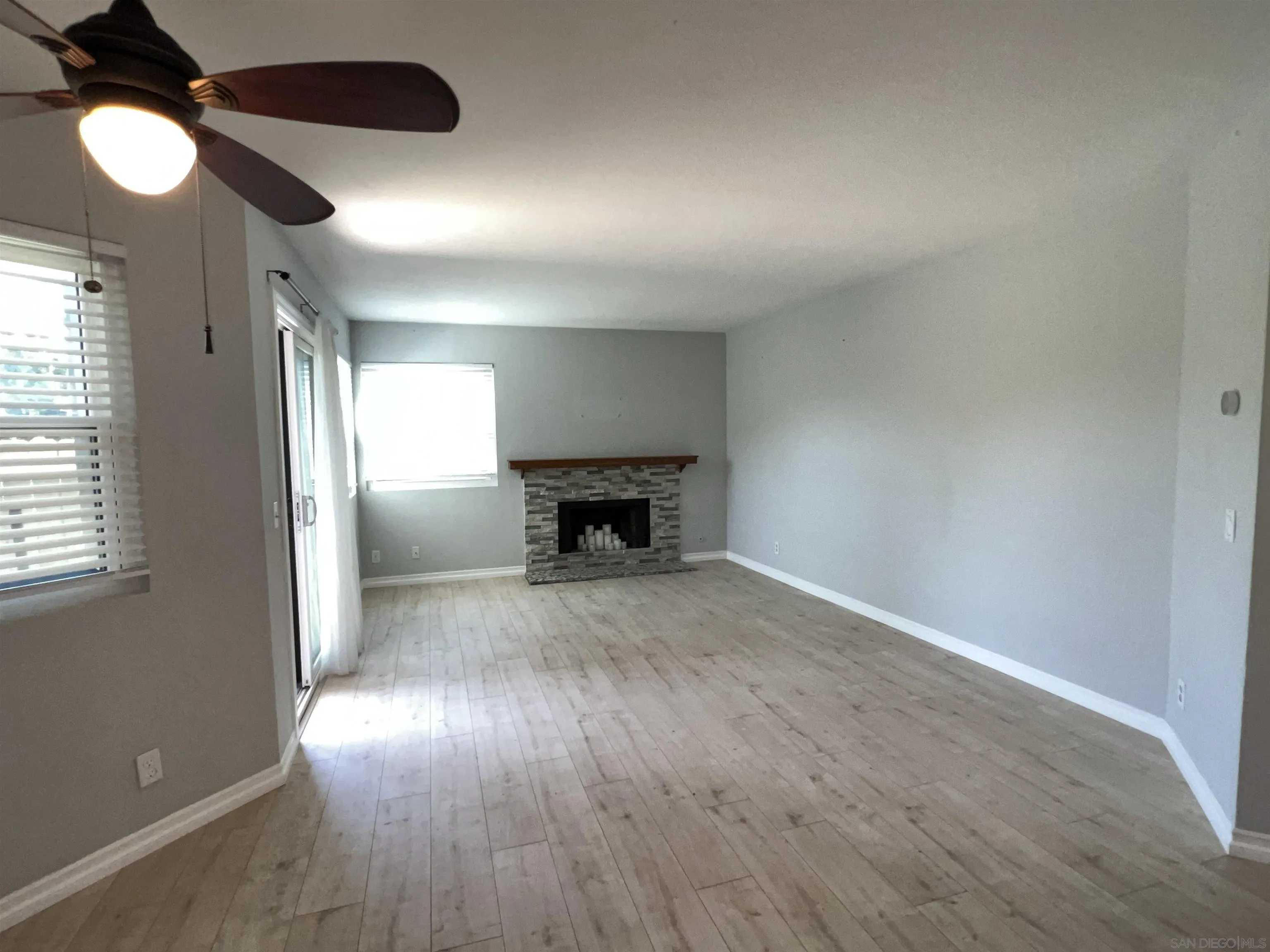 3043 Chipwood Court Spring Valley, CA 91978 - Photo 5 of 38 wooden floor in an empty room with a window