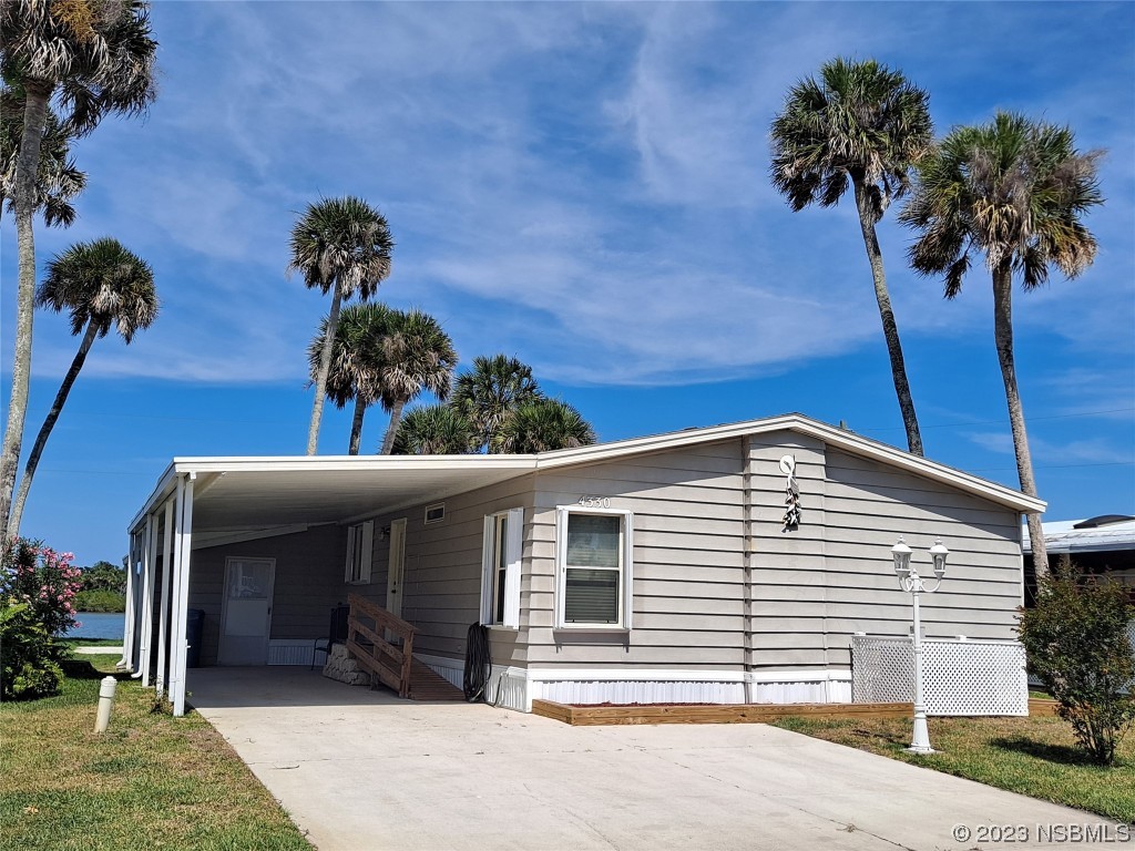 a view of a house with a garage