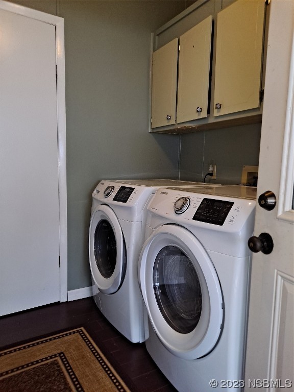4330 Whiting Way Edgewater, FL 32141 - Photo 17 of 30 a utility room with dryer and washer