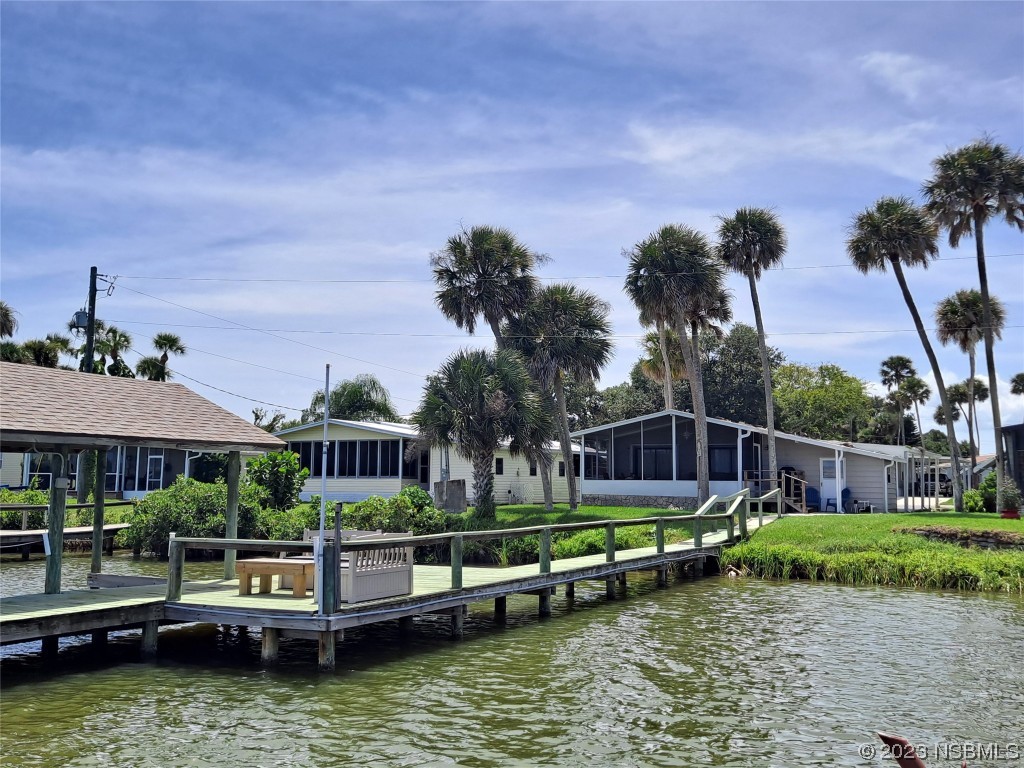 4330 Whiting Way Edgewater, FL 32141 - Photo 2 of 30 a small view of a house with swimming pool and a yard