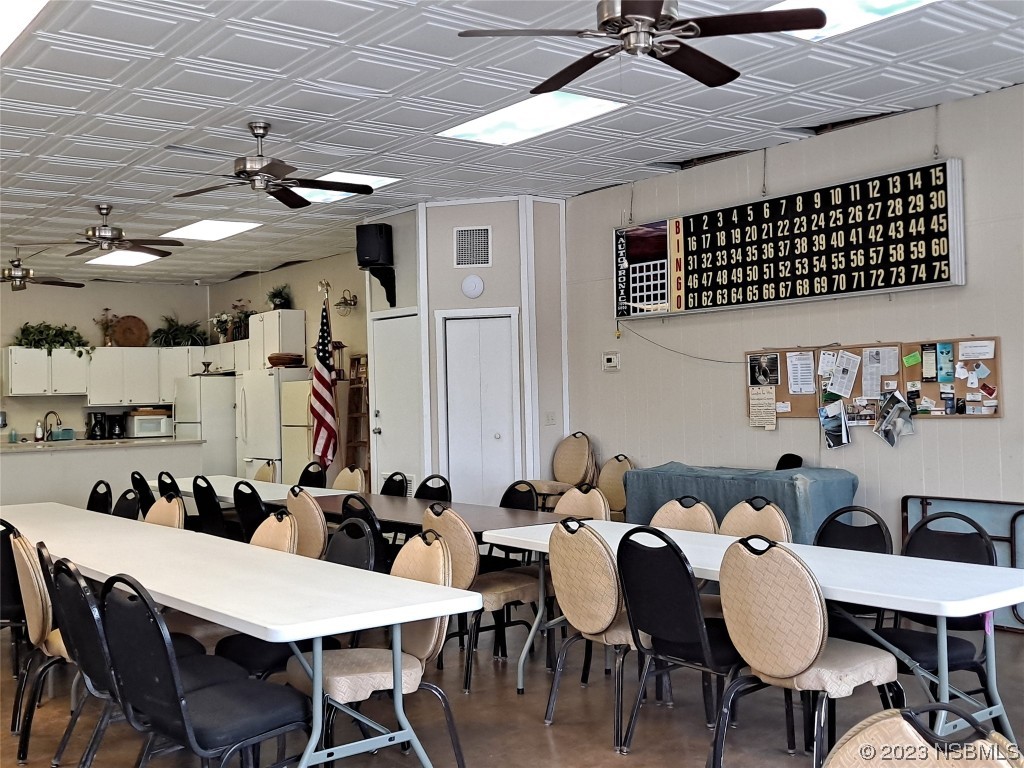 4330 Whiting Way Edgewater, FL 32141 - Photo 27 of 30 a view of a dining room with furniture