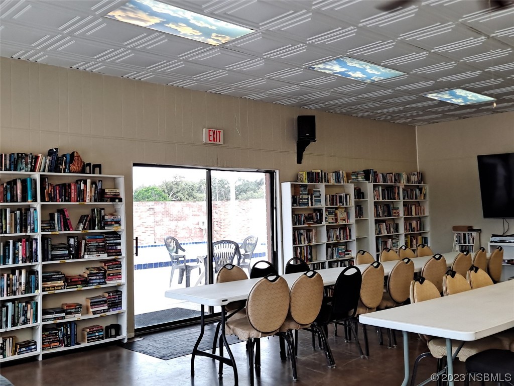 4330 Whiting Way Edgewater, FL 32141 - Photo 29 of 30 a view of a livingroom with furniture and a bookshelf