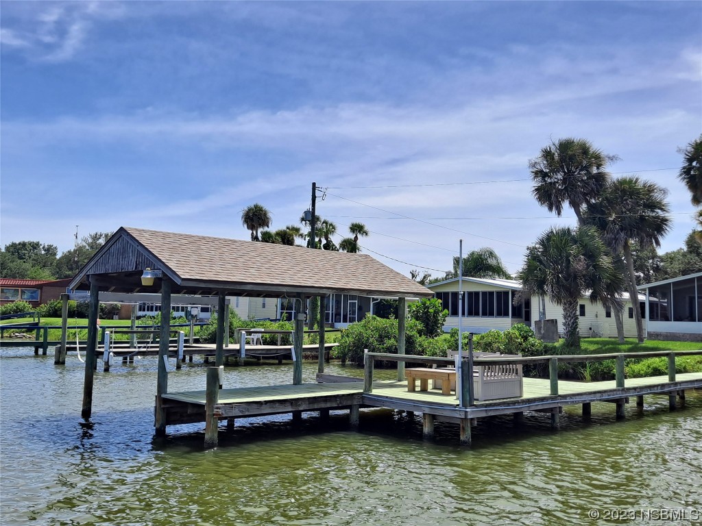 4330 Whiting Way Edgewater, FL 32141 - Photo 3 of 30 a swimming pool view with a seating space