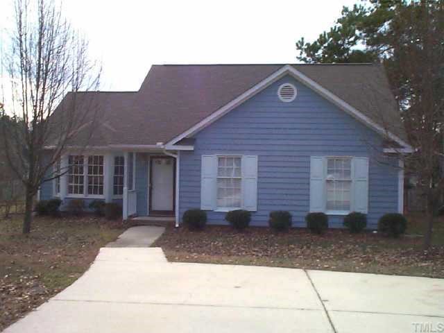 3705 Kroll Court Raleigh, NC 27616 - Photo 1 of 1 a front view of a house with garden