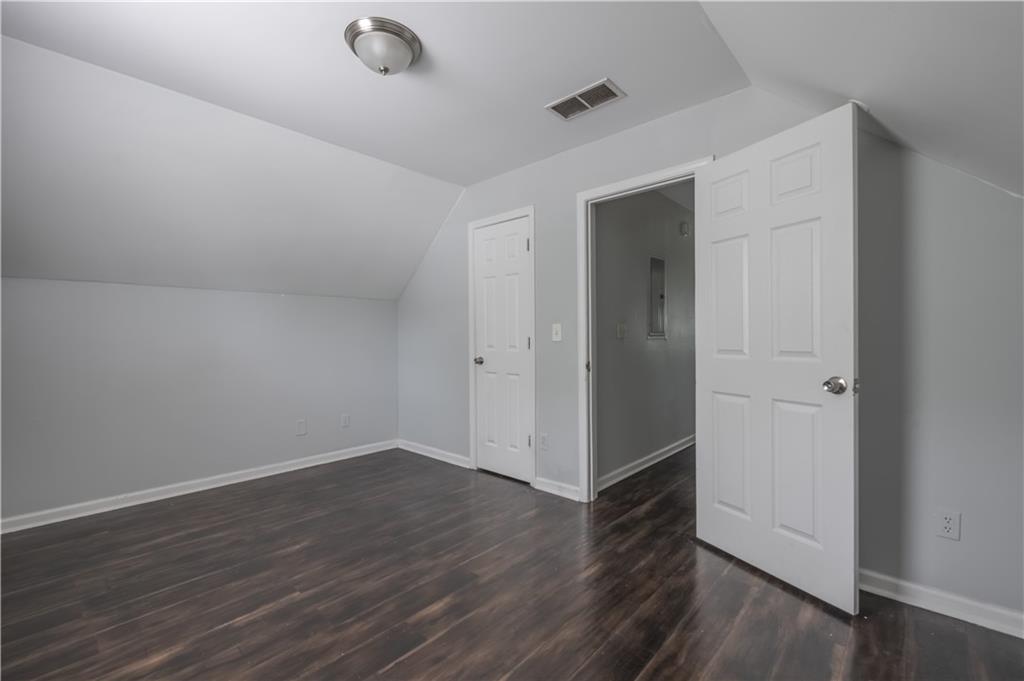 1607 Ralph David Abernathy Boulevard Southwest Atlanta, GA 30310 - Photo 12 of 16 wooden floor in an empty room