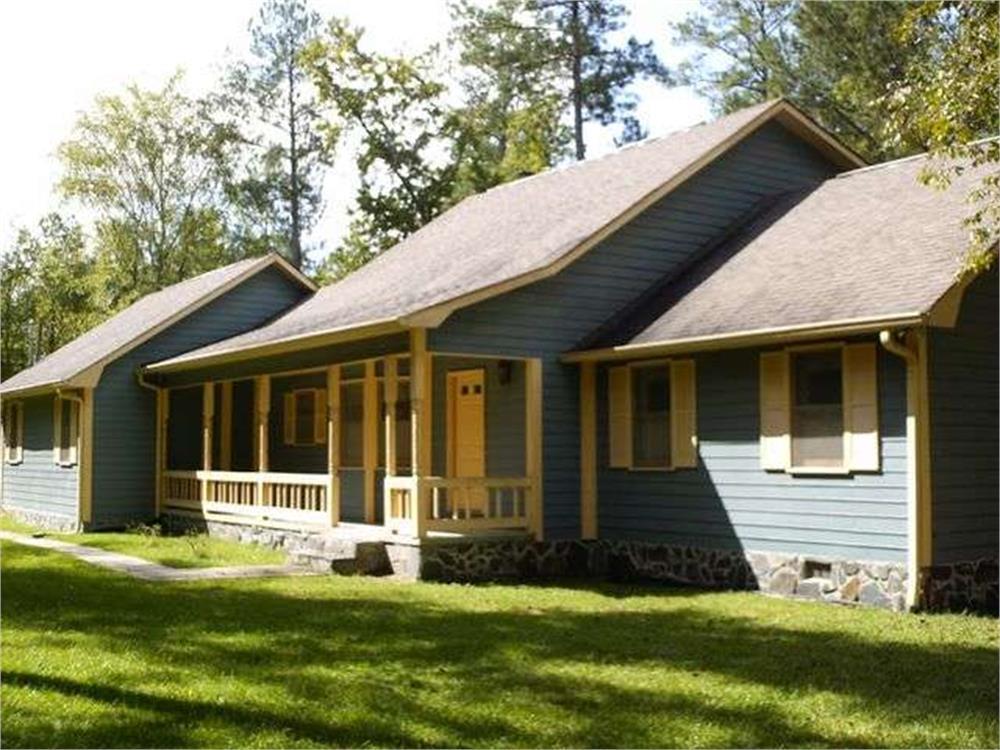 1818 Pate Road Juliette, GA 31046 - Photo 1 of 1 a view of a house with a large window and a yard with plants and large tree