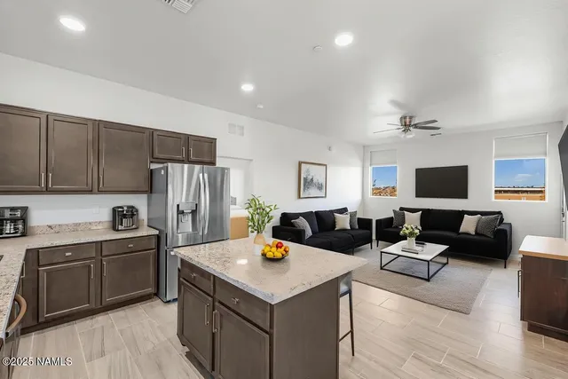 a bedroom with a bed and a couch