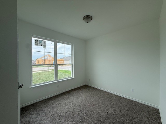 2607 Falcon Ridge Drive Bryan, TX 77803 - Photo 5 of 8 an empty room with a window