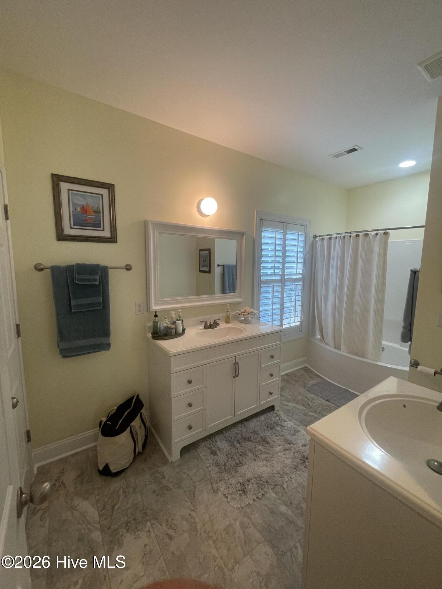 97 Woodbury Road Elizabethtown, NC 28337 - Photo 13 of 26 Downstairs bathroom- adjoins primary and hall