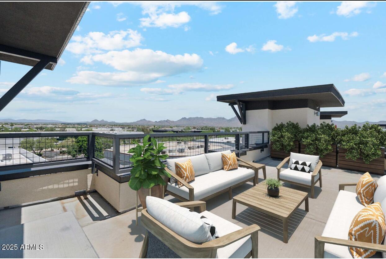 15501 North Dial Boulevard, Unit A1 Scottsdale, AZ 85260 - Photo 11 of 24 a view of balcony with couch and chairs