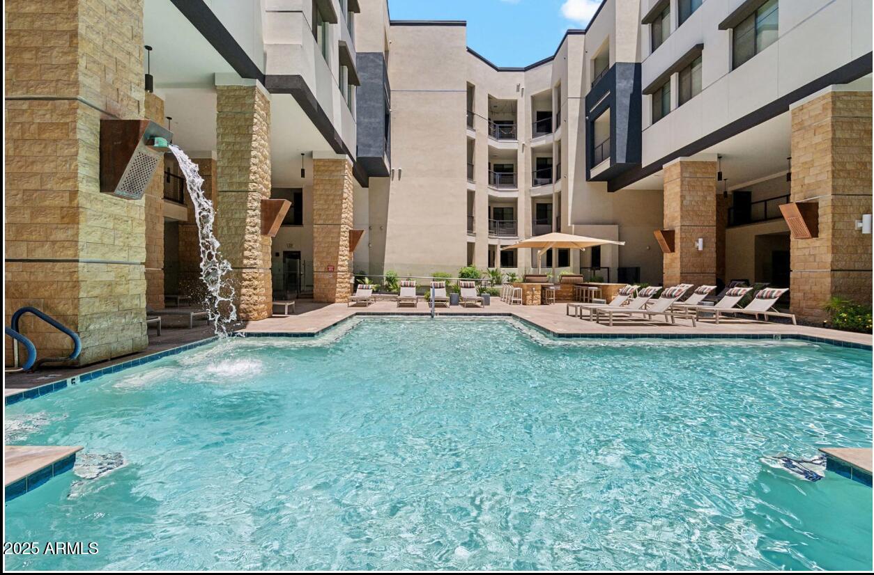 15501 North Dial Boulevard, Unit A1 Scottsdale, AZ 85260 - Photo 5 of 24 a view of a building with backyard