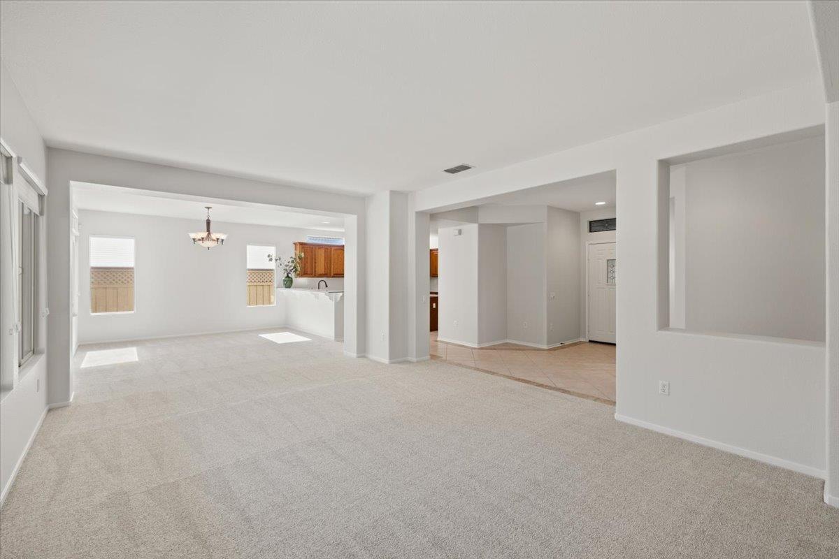 851 Rocky Ridge Lane Lincoln, CA 95648 - Photo 6 of 31 a view of an empty room with a window