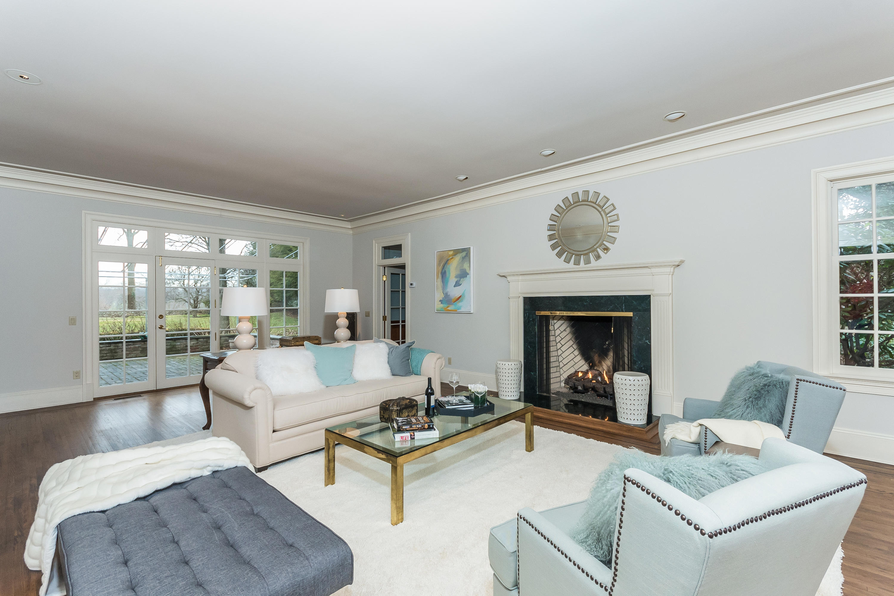 459 Middlesex Road Darien, CT 06820 - Photo 8 of 53 a living room with furniture and a fireplace