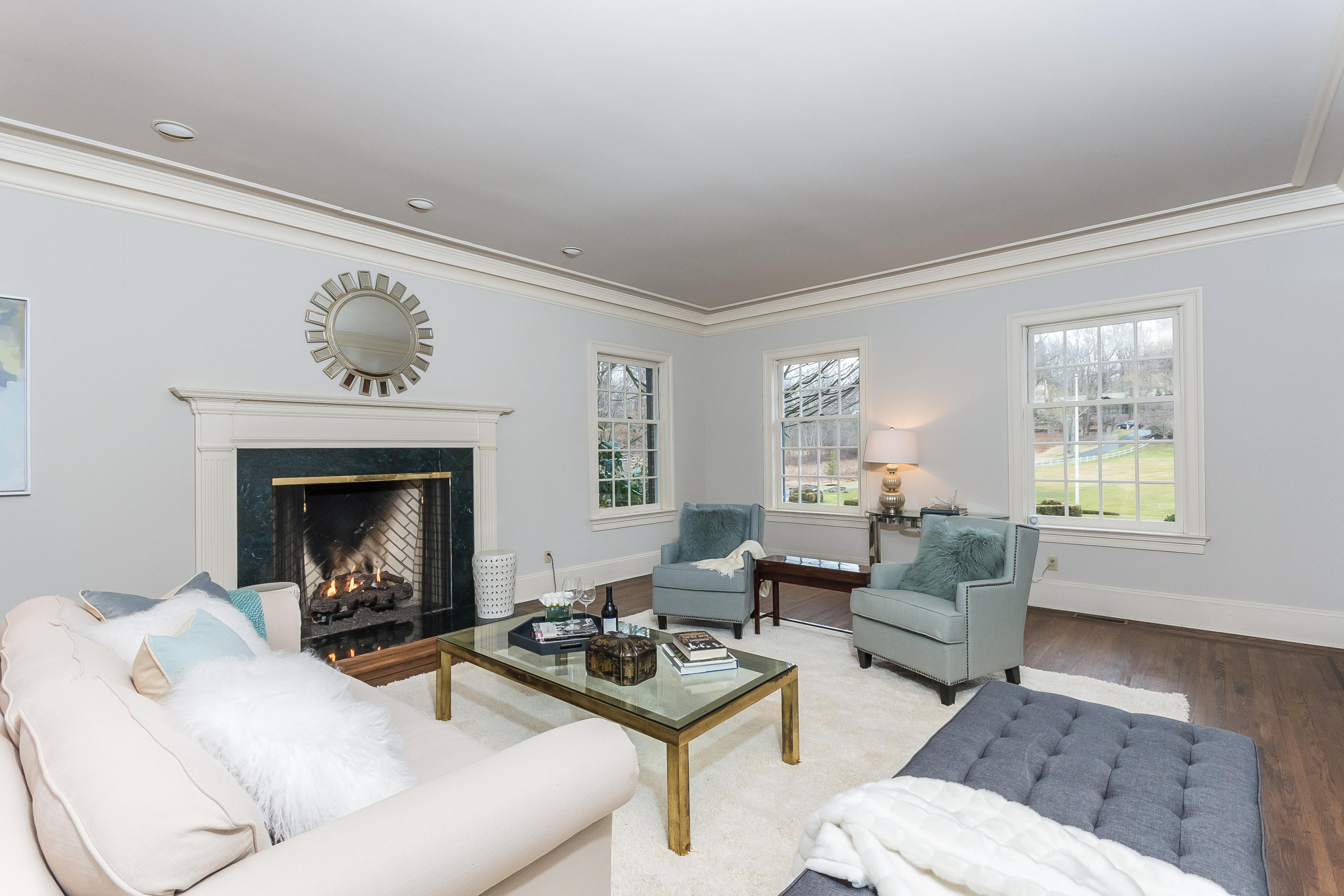 459 Middlesex Road Darien, CT 06820 - Photo 9 of 53 a living room with furniture and a fireplace