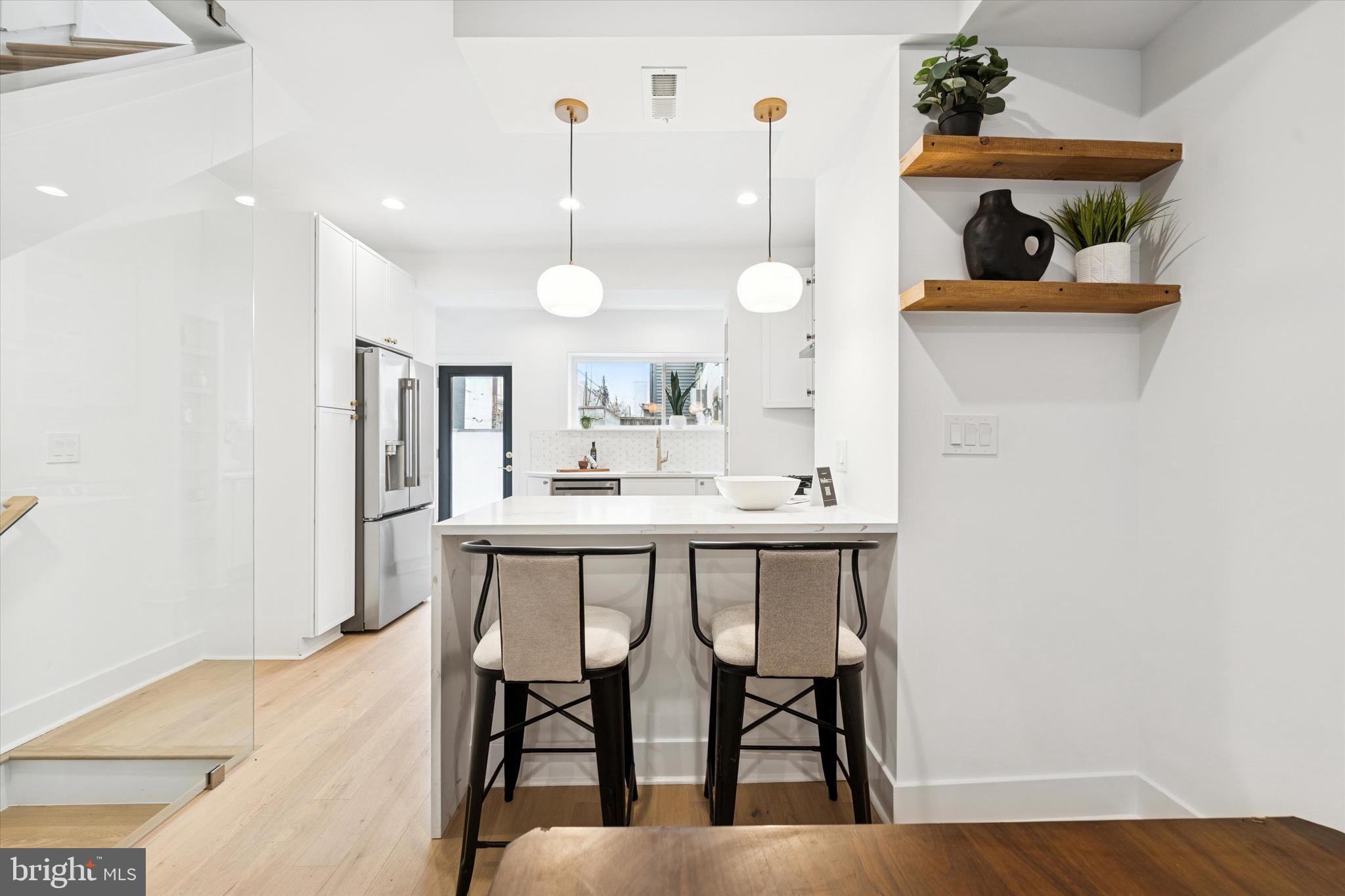 1019 Ellsworth Street Philadelphia, PA 19147 - Photo 9 of 31 a view of dining table and chairs