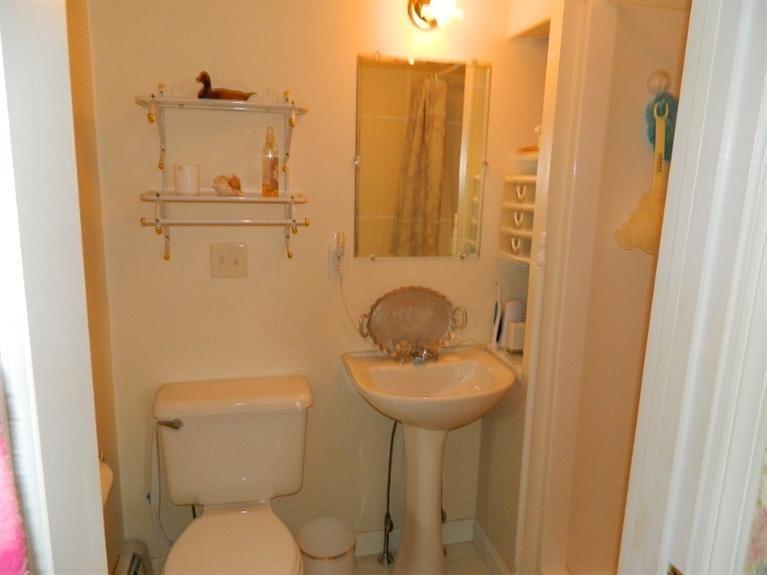 11 Harbor Bluff Road Hyannis, MA 02601 - Photo 24 of 30 a bathroom with a sink a toilet and shower