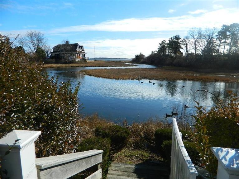 11 Harbor Bluff Road Hyannis, MA 02601 - Photo 8 of 30 a view of a lake in middle of the forest