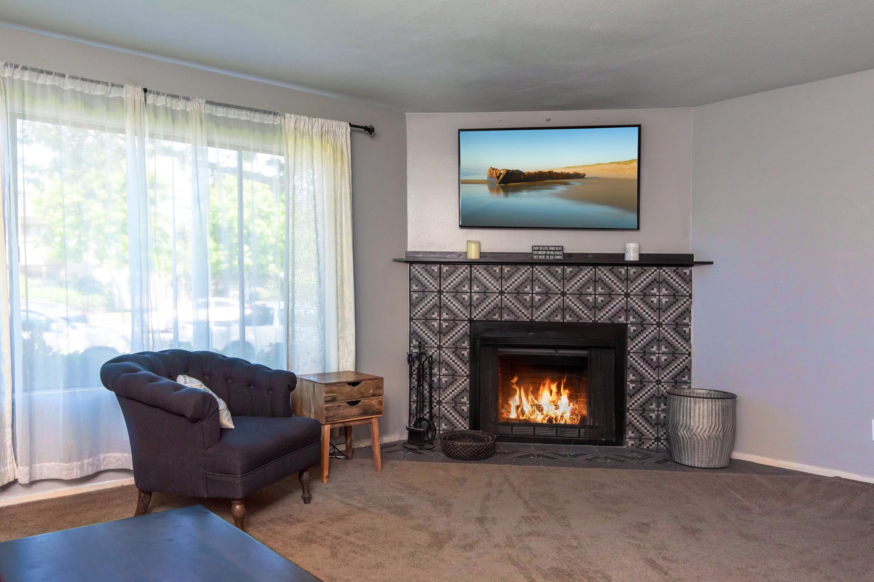 202 North R Street Lompoc, CA 93436 - Photo 4 of 12 a living room with furniture and a fireplace