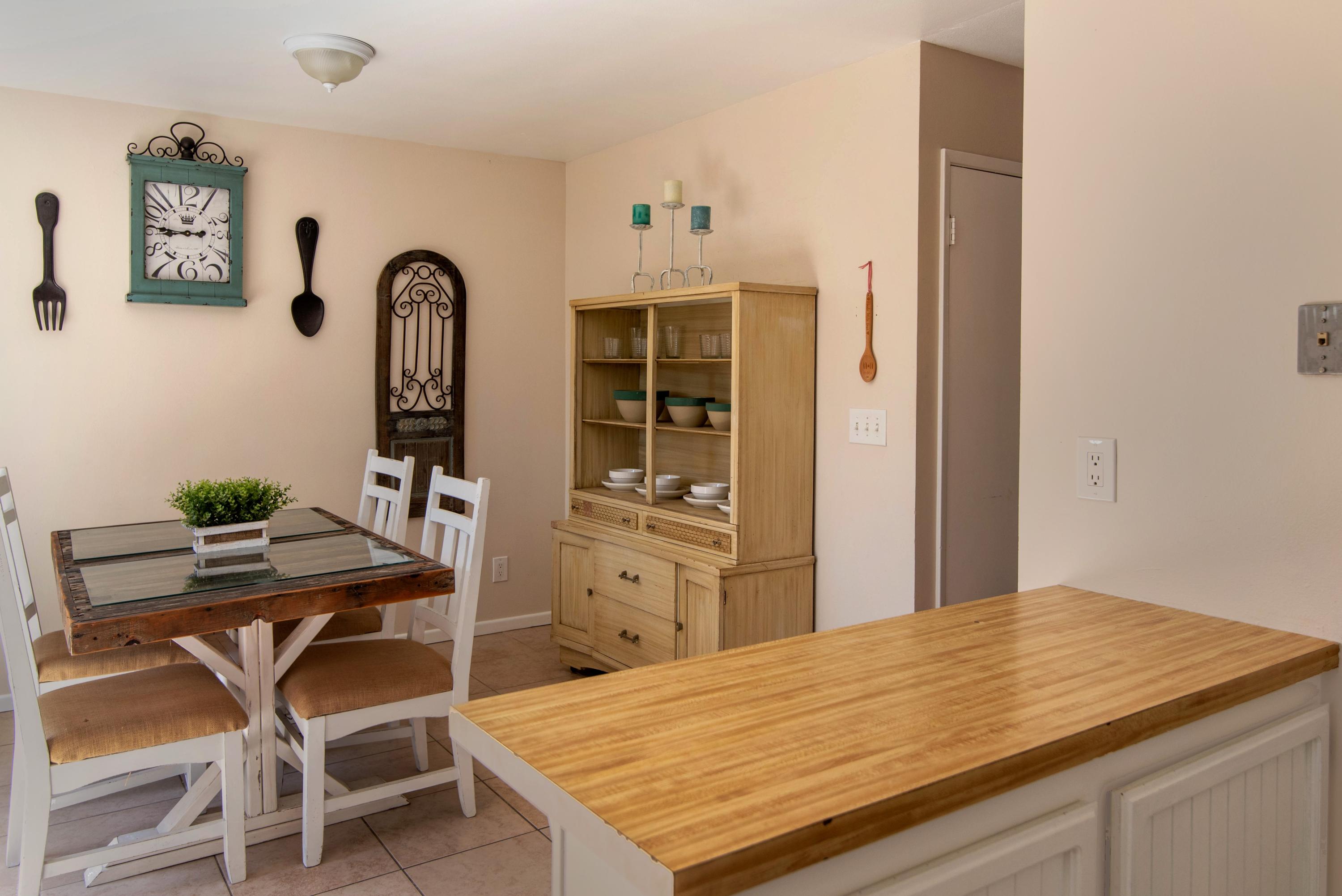 202 North R Street Lompoc, CA 93436 - Photo 6 of 12 a room with a table chairs and entryway