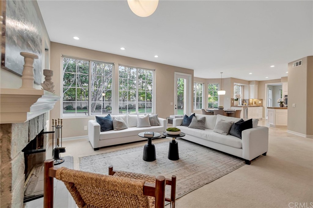 22 Meryton Irvine, CA 92603 - Photo 15 of 37 a living room with furniture and a large window