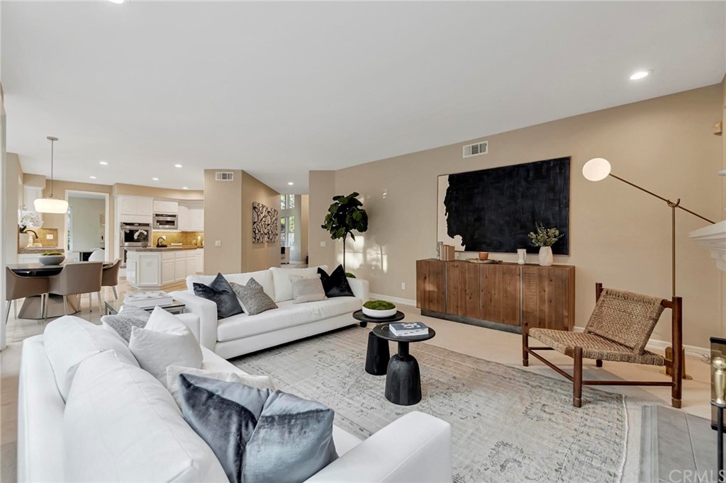 22 Meryton Irvine, CA 92603 - Photo 16 of 37 a living room with furniture and a flat screen tv