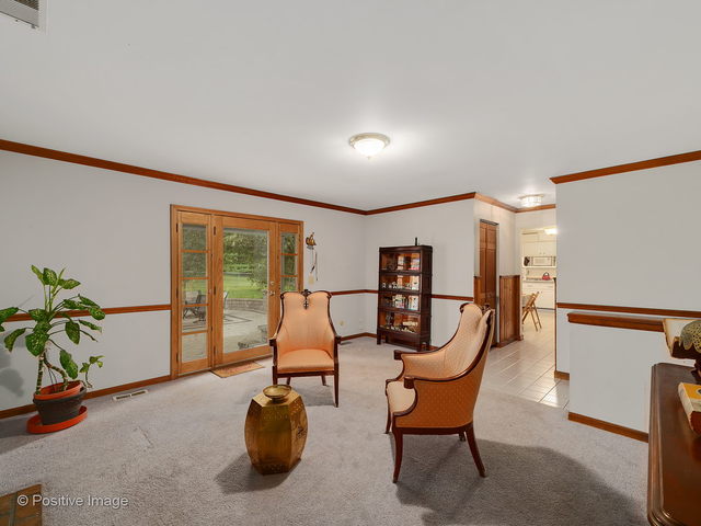 28W241 Garys Mill Road Winfield, IL 60190 - Photo 14 of 34 a bedroom with furniture and a potted plant