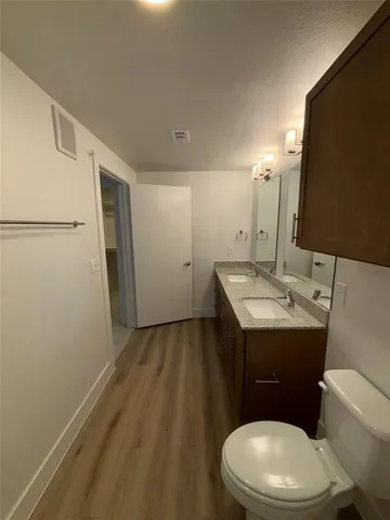 a bathroom with a sink and a toilet