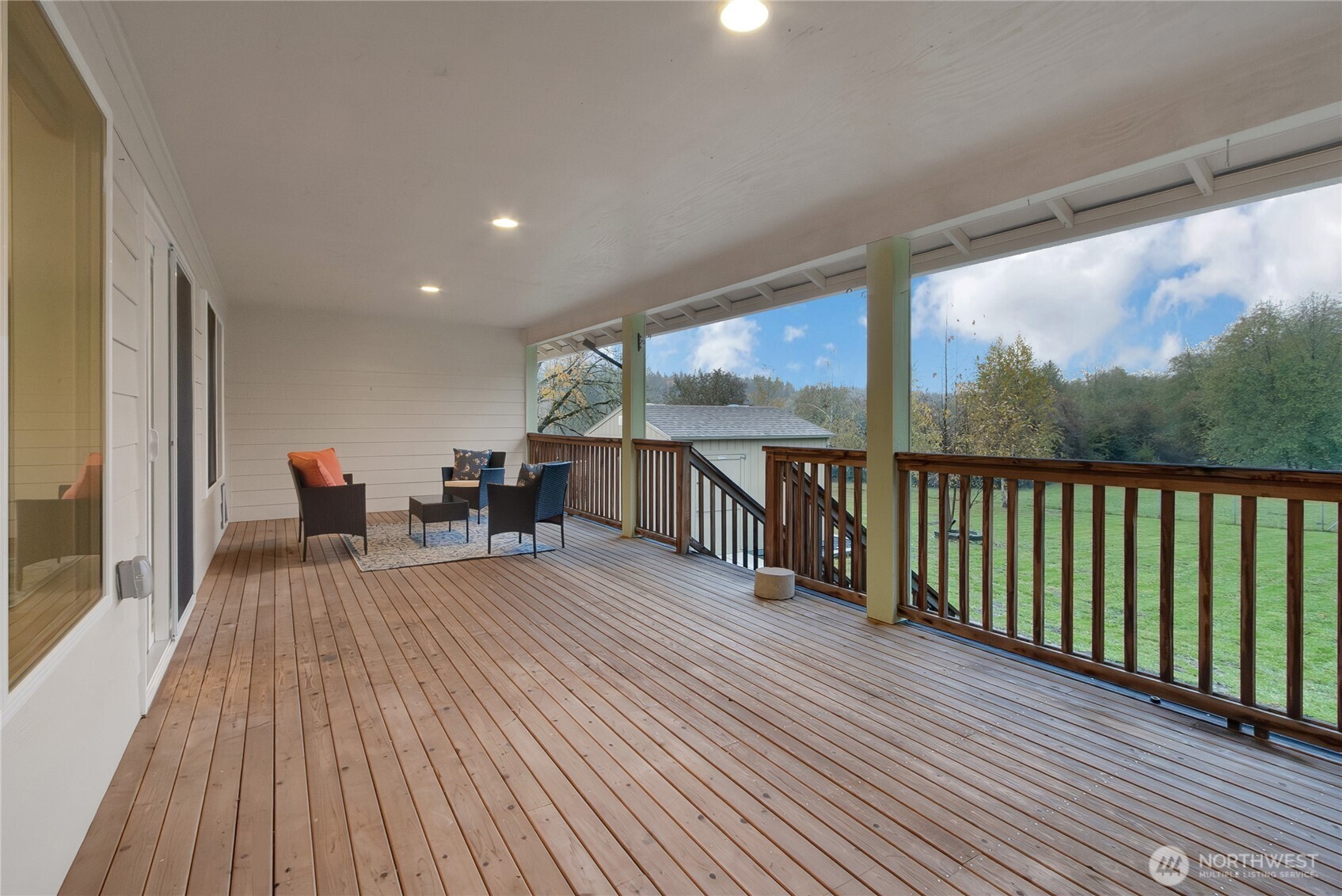 1450 Southeast Spruce Road Port Orchard, WA 98367 - Photo 12 of 35 a view of a patio with wooden floor