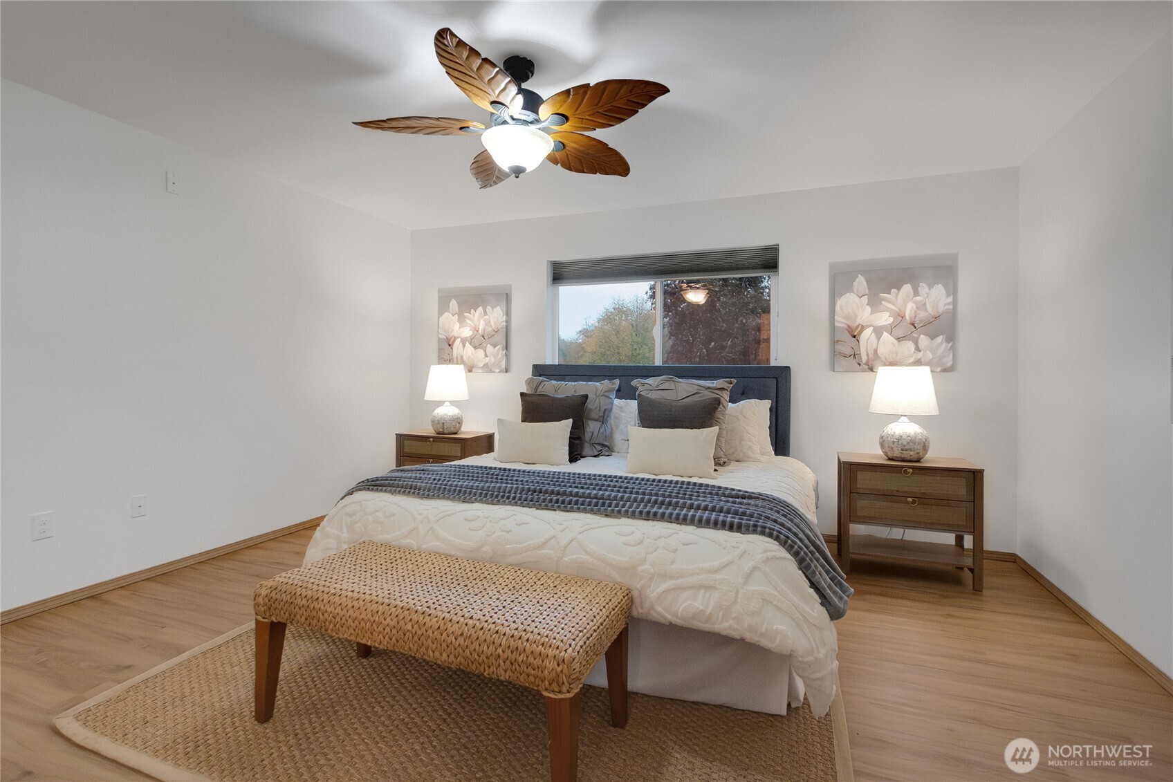 1450 Southeast Spruce Road Port Orchard, WA 98367 - Photo 23 of 35 a bedroom with a bed chandelier and a window