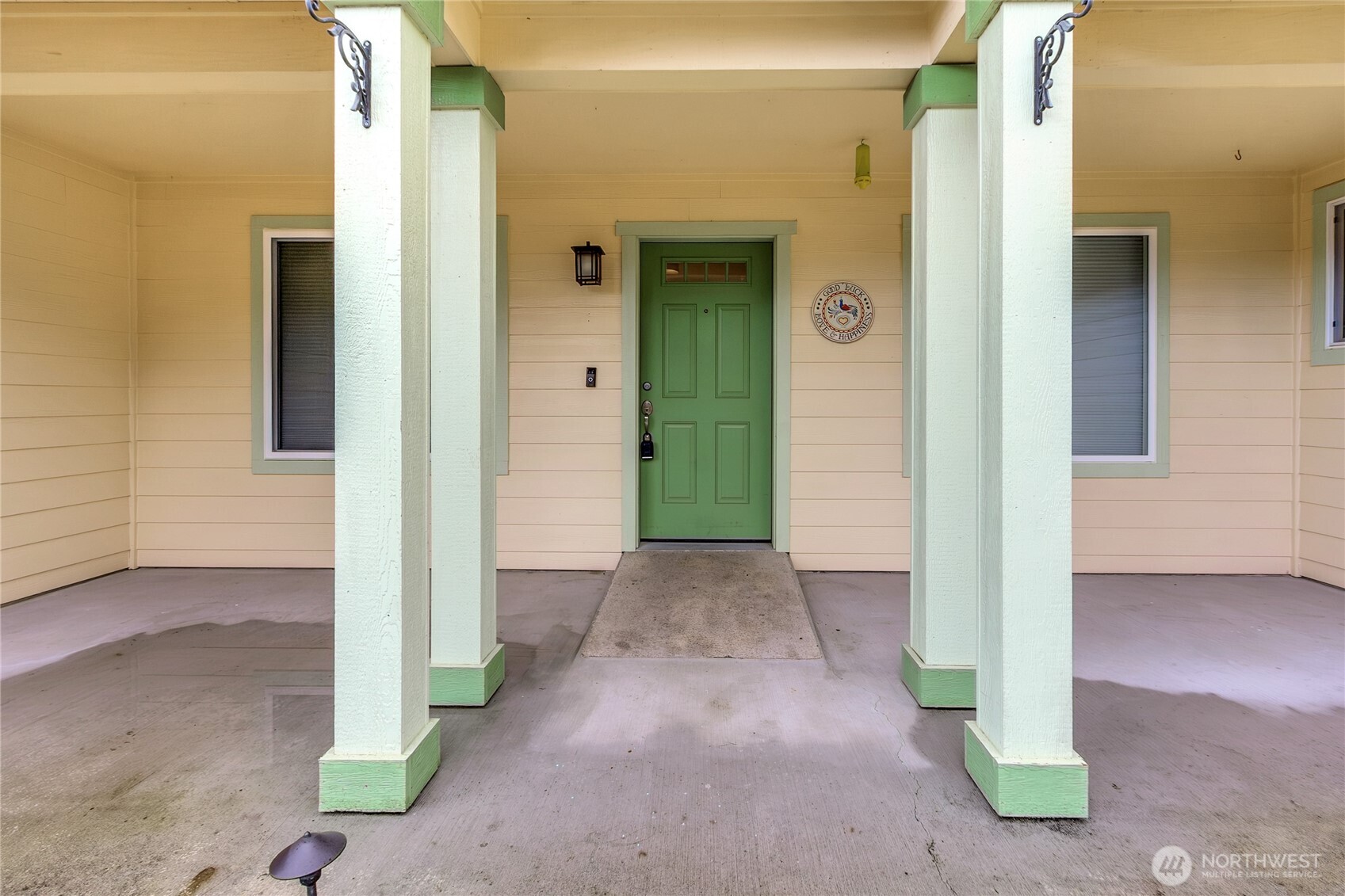 1450 Southeast Spruce Road Port Orchard, WA 98367 - Photo 3 of 35 a view of a hallway with wooden door