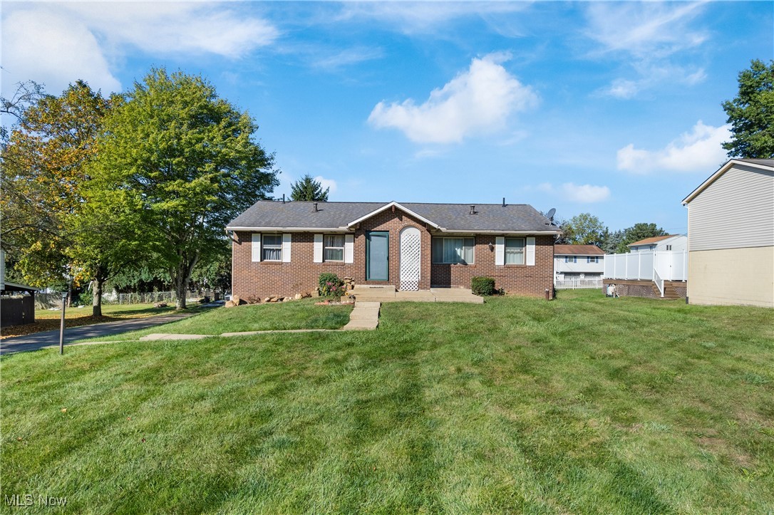 703 Perry Drive Northwest Canton, OH 44708 - Photo 1 of 9 Ranch-style home with brick siding