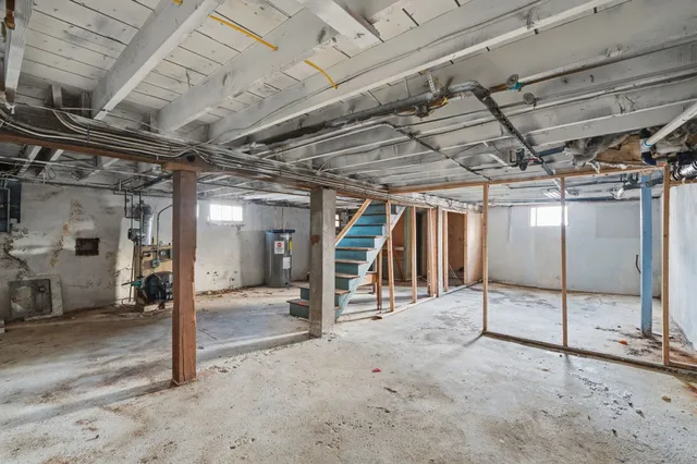 a view of a room with wooden ceiling