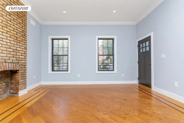 a bedroom with a bed and book shelf